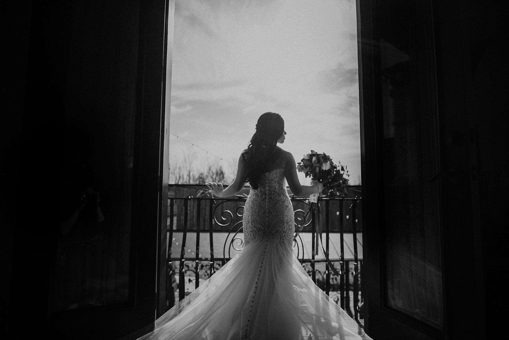 Bride on juliet balcony